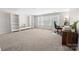 Spacious bonus room featuring neutral colors, natural light, and carpeted flooring at 2333 Talon Point Cir, Fort Mill, SC 29715
