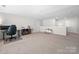Open bonus room with plush carpet flooring, neutral paint, and lots of natural light at 2333 Talon Point Cir, Fort Mill, SC 29715