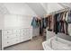 Large walk-in closet with ample storage shelving and a white dresser at 2333 Talon Point Cir, Fort Mill, SC 29715