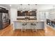 Modern kitchen with granite island, pendant lighting, stainless steel appliances, and breakfast bar at 2333 Talon Point Cir, Fort Mill, SC 29715