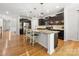Modern kitchen with granite island, pendant lighting, stainless steel appliances, and breakfast bar at 2333 Talon Point Cir, Fort Mill, SC 29715