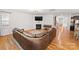 Cozy living room with fireplace, hardwood floors, and modern lighting at 2333 Talon Point Cir, Fort Mill, SC 29715