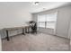Bright office with lots of natural light, carpeted floors and neutral tones at 2333 Talon Point Cir, Fort Mill, SC 29715