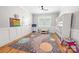 Spacious playroom offers great natural light, playful decor, and hardwood floors for hours of fun at 2333 Talon Point Cir, Fort Mill, SC 29715