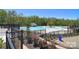 Beautiful community pool area featuring a splash fountain, sundeck, and mature plantings at 2333 Talon Point Cir, Fort Mill, SC 29715