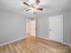 This bedroom has new floors, light paint, and a ceiling fan at 268 Jefferson Ne Ct, Concord, NC 28025