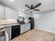 Well-designed kitchen featuring grey cabinets, stainless steel appliances and modern flooring at 268 Jefferson Ne Ct, Concord, NC 28025