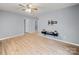 Open living room area featuring new wood floors, modern fixtures, and a cozy atmosphere at 268 Jefferson Ne Ct, Concord, NC 28025