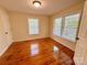 Cozy bedroom with hardwood floors, natural light and neutral walls at 2724 Peachtree Rd, Statesville, NC 28625