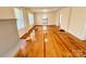 Spacious living room featuring gleaming hardwood floors and natural light at 2724 Peachtree Rd, Statesville, NC 28625