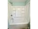 Clean shower tub combination with molded shelves and chrome fixtures at 2724 Peachtree Rd, Statesville, NC 28625