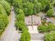 Aerial view of the home, illustrating its location, landscaping, and proximity to the surrounding neighborhood at 3004 Village Ridge Dr, Gastonia, NC 28056