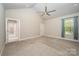Vaulted ceiling bedroom with ample natural light, neutral carpet, and attached bath at 3004 Village Ridge Dr, Gastonia, NC 28056