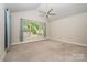 Spacious vaulted ceiling bedroom with neutral carpet and large window views at 3004 Village Ridge Dr, Gastonia, NC 28056