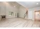 Open living room with high ceilings, a fireplace, light wood floors, and lots of natural light at 3004 Village Ridge Dr, Gastonia, NC 28056