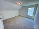 Bright bedroom with neutral carpet, window, and recessed lighting for comfortable living at 3022 Cedar Falls Dr # 16, Waxhaw, NC 28173