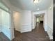 Spacious foyer with beautiful wood floors and molding, leading into the home's open living spaces at 3022 Cedar Falls Dr # 16, Waxhaw, NC 28173