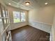 Office space featuring hardwood floors, natural lighting, and white molding at 3022 Cedar Falls Dr # 16, Waxhaw, NC 28173