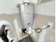 Close up of a Rinnai tankless water heater at 3022 Cedar Falls Dr # 16, Waxhaw, NC 28173