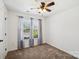 A bedroom with curtains over the windows and a ceiling fan at 3219 Cottage Rose Ln, Rock Hill, SC 29732
