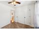 A bedroom with a ceiling fan and a view into the kitchen at 3219 Cottage Rose Ln, Rock Hill, SC 29732