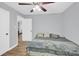 Serene bedroom with hardwood floors, neutral walls, a ceiling fan, and an inviting atmosphere at 3300 Bonaire Dr, Charlotte, NC 28208