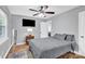 Spacious bedroom featuring modern lighting and a comfortable bed, creating an inviting space at 3300 Bonaire Dr, Charlotte, NC 28208