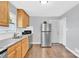 Well-lit kitchen featuring stainless steel appliances, and granite counters at 3300 Bonaire Dr, Charlotte, NC 28208