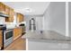 Spacious kitchen featuring stainless steel appliances and granite countertops at 3300 Bonaire Dr, Charlotte, NC 28208