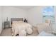 Cozy bedroom featuring neutral decor, a comfortable bed, and soft natural light at 334 Bluebonnet Dr, Salisbury, NC 28146