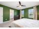 Bedroom featuring a ceiling fan, two windows, and a dresser in the corner of the room at 334 Bluebonnet Dr, Salisbury, NC 28146