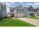 Well-manicured lawn complements this two-story home, featuring a two-car garage and classic design at 334 Bluebonnet Dr, Salisbury, NC 28146