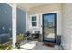 Cozy front porch with seating and a decorative entrance, welcoming you home at 334 Bluebonnet Dr, Salisbury, NC 28146