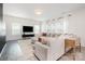Bright living room with large gray sectional sofa, TV, and open-concept design at 334 Bluebonnet Dr, Salisbury, NC 28146