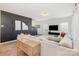 Spacious living room with stylish black accent wall and comfortable gray sectional sofa at 334 Bluebonnet Dr, Salisbury, NC 28146