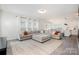 Comfortable living room featuring an oversized sectional sofa and an open layout at 334 Bluebonnet Dr, Salisbury, NC 28146