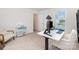 Bright office area with natural light, a modern desk setup, and carpet flooring at 334 Bluebonnet Dr, Salisbury, NC 28146