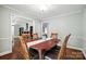 Charming dining room with hardwood floors, traditional table, and an elegant setting at 3378 Tanglewood Dr, Rock Hill, SC 29732