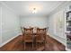 Bright dining room with hardwood floors, traditional table, and an elegant setting at 3378 Tanglewood Dr, Rock Hill, SC 29732