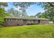 Ranch-style brick house with a well-manicured lawn and mature trees at 3378 Tanglewood Dr, Rock Hill, SC 29732