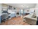 Inviting living room with hardwood floors, a cozy fireplace, and built-in bookshelves for added charm at 3378 Tanglewood Dr, Rock Hill, SC 29732