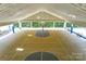 Spacious indoor basketball court with benches, overhead lighting, and clear court markings at 349 Miners Cove Way, Fort Mill, SC 29708