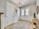 Inviting foyer with stylish lighting, elegant rug, and decorative wall accents sets a sophisticated tone at 349 Miners Cove Way, Fort Mill, SC 29708