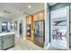 Well-designed kitchen adjacent to dining room features a stainless steel refrigerator and ample cabinet space at 349 Miners Cove Way, Fort Mill, SC 29708