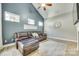 Comfortable living room featuring high ceilings, recessed lighting, and cozy furniture at 349 Miners Cove Way, Fort Mill, SC 29708