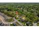 Aerial perspective of a house with a pool nestled within a neighborhood surrounded by verdant trees at 3755 11Th Ne St, Hickory, NC 28601