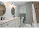 Charming bathroom featuring double vanity, updated fixtures, and shiplap accents at 3755 11Th Ne St, Hickory, NC 28601