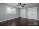 Bedroom featuring hardwood floors, natural light, and ample closet space at 3755 11Th Ne St, Hickory, NC 28601