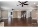 Large living area boasting hardwood floors and ample space, leading to other rooms at 3755 11Th Ne St, Hickory, NC 28601