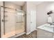 Bathroom with a sliding glass shower door and a single vanity at 3939 Archer Notch Ln, Huntersville, NC 28078